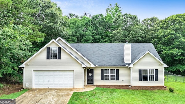 460 Old Tree Dr, Jackson, GA 30233 - traditional home featuring concrete driveway, a chimney, and an attached garage