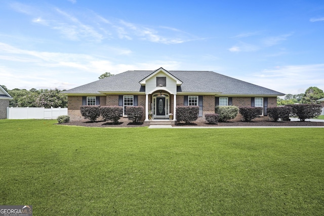 510 Braves Field Dr, Guyton, GA 31312 - ranch-style house with brick siding and a shingled roof