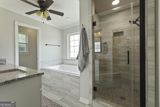 510 Braves Field Dr, Guyton, GA 31312 - bathroom featuring a garden tub, vanity, a shower stall, ceiling fan, and ornamental molding