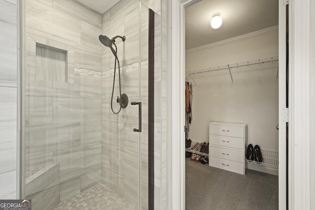 510 Braves Field Dr, Guyton, GA 31312 - full bathroom with a shower stall, ornamental molding, and a spacious closet