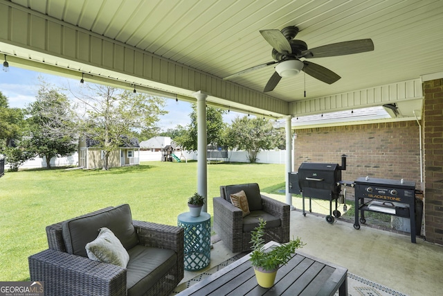 510 Braves Field Dr, Guyton, GA 31312 - view of patio / terrace with an outdoor hangout area, a playground, a ceiling fan, grilling area, and an outbuilding