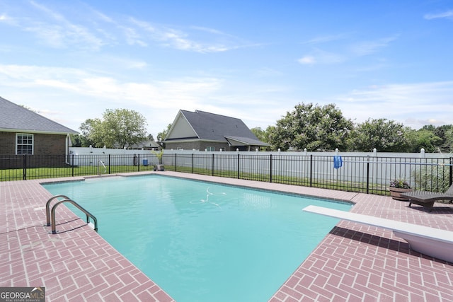 510 Braves Field Dr, Guyton, GA 31312 - view of pool with a diving board and a patio