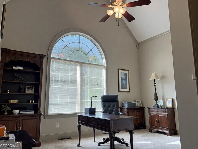 232 Darwish Dr, Mcdonough, GA 30252 - home office with a ceiling fan, light colored carpet, ornamental molding, high vaulted ceiling, and baseboards