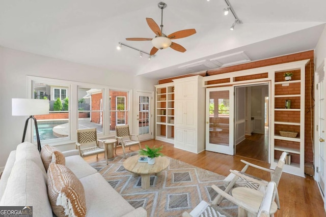 2903 Ashebrooke Dr NE, Marietta, GA 30068 - living area with track lighting, light wood-style floors, attic access, a ceiling fan, and lofted ceiling