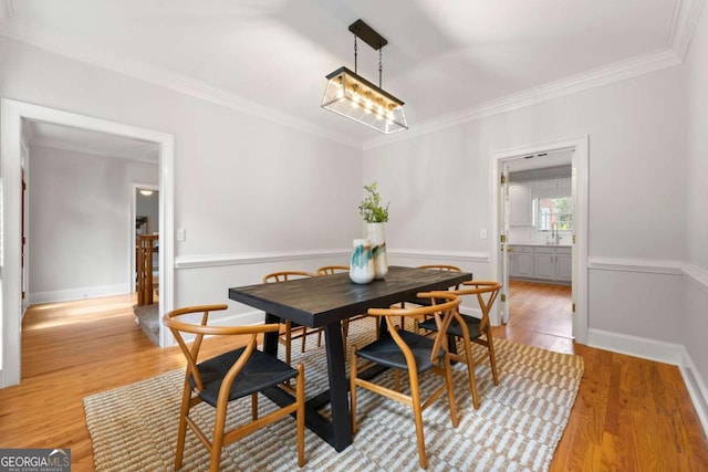2903 Ashebrooke Dr NE, Marietta, GA 30068 - dining area featuring ornamental molding and light wood finished floors