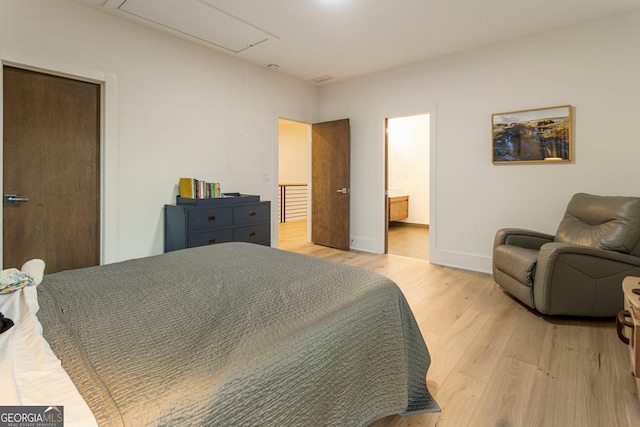 1045 Shepherds Ln NE, Atlanta, GA 30324 - bedroom featuring light wood-style flooring and attic access