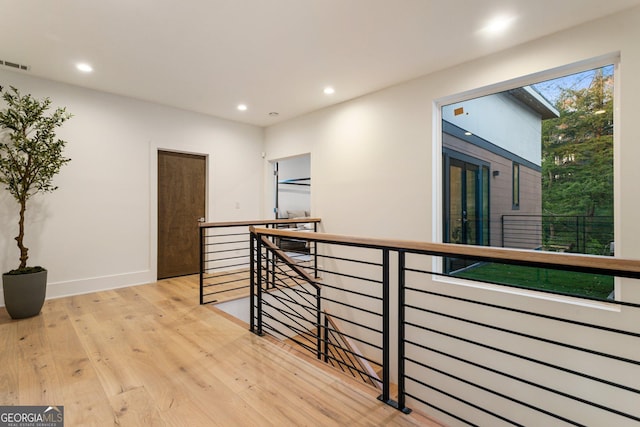 1045 Shepherds Ln NE, Atlanta, GA 30324 - hall featuring an upstairs landing, recessed lighting, and wood finished floors