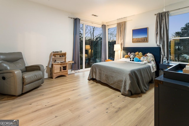 1045 Shepherds Ln NE, Atlanta, GA 30324 - bedroom featuring light wood-type flooring