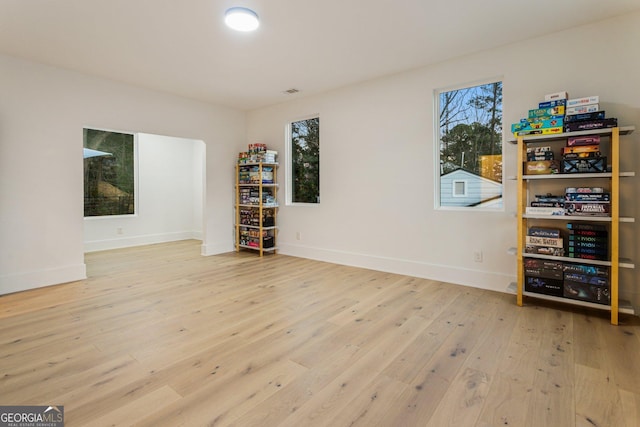 1045 Shepherds Ln NE, Atlanta, GA 30324 - spare room with hardwood / wood-style flooring and baseboards