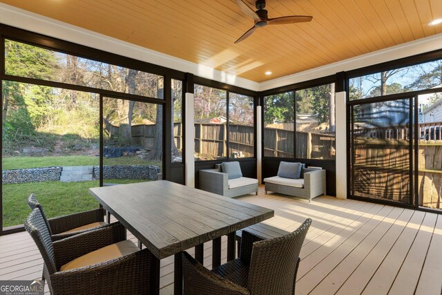 1045 Shepherds Ln NE, Atlanta, GA 30324 - sunroom / solarium with a ceiling fan and outdoor dining area
