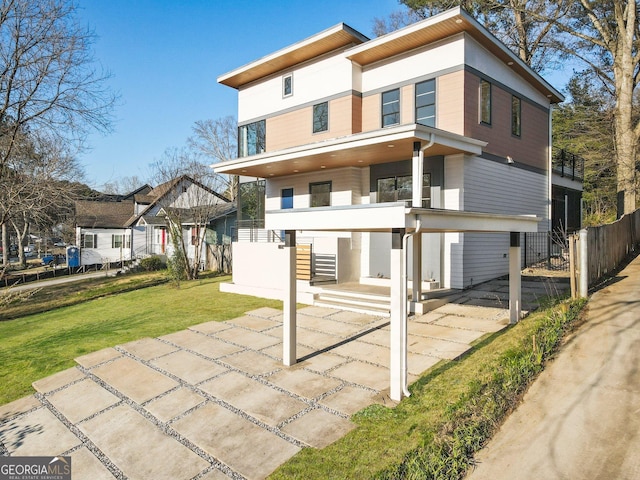 1045 Shepherds Ln NE, Atlanta, GA 30324 - back of property with stucco siding and covered porch