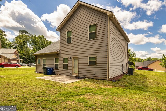 874 Crescent Ln Unit 52, Griffin, GA 30224 - back of property featuring a patio and a lawn