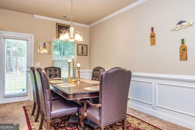 874 Crescent Ln Unit 52, Griffin, GA 30224 - dining area with carpet flooring, a chandelier, ornamental molding, a wainscoted wall, and a decorative wall
