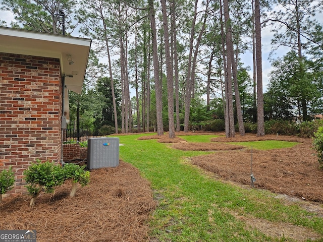 29 Jef Rd, Statesboro, GA 30458 - view of grassy yard featuring central air condition unit