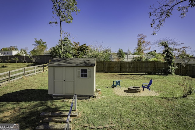 74 Hollis Hts, Newnan, GA 30263 - fenced backyard with an outdoor fire pit and a shed