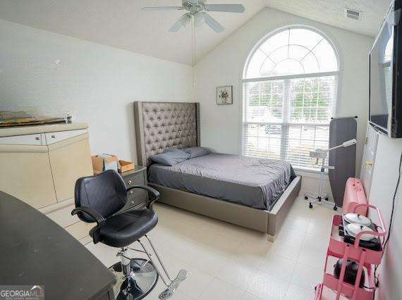 2840 General Lee Way, Buford, GA 30519 - bedroom featuring lofted ceiling and a ceiling fan