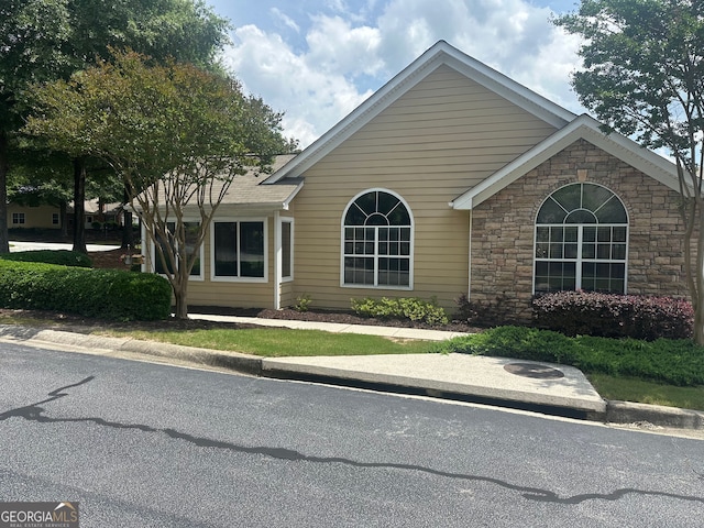2191 SW Rockbridge Rd Unit 2603, Stone Mountain, GA 30087 - view of front facade featuring stone siding