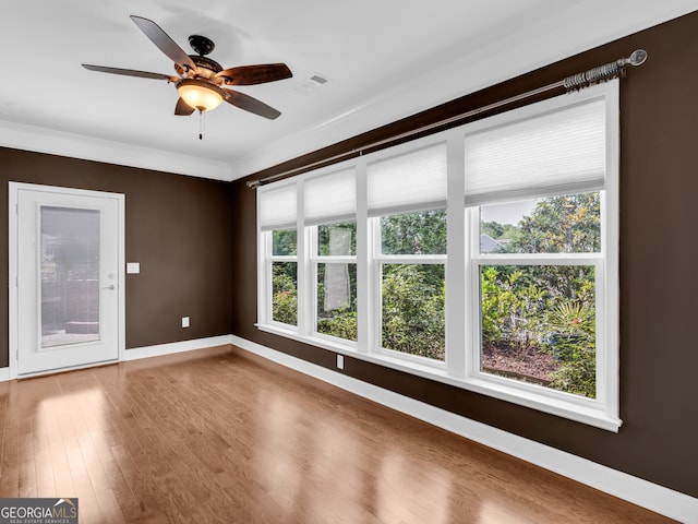 302 Burberry Ct, Griffin, GA 30223 - spare room with a ceiling fan, baseboards, and wood finished floors