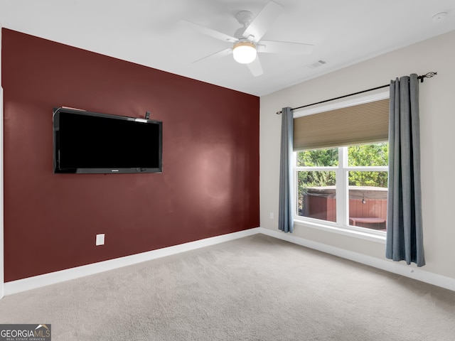302 Burberry Ct, Griffin, GA 30223 - unfurnished room featuring carpet floors, baseboards, and ceiling fan