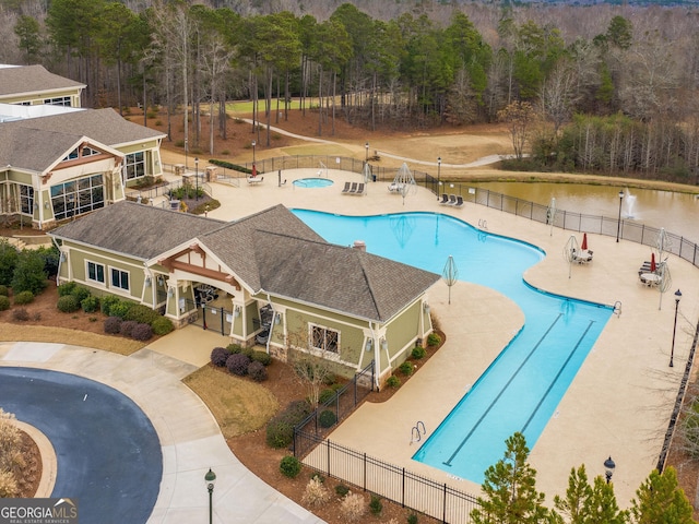 302 Burberry Ct, Griffin, GA 30223 - community pool featuring a patio area and a water view