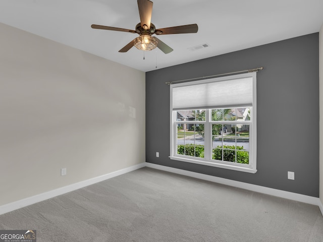 302 Burberry Ct, Griffin, GA 30223 - empty room with baseboards, carpet flooring, and a ceiling fan