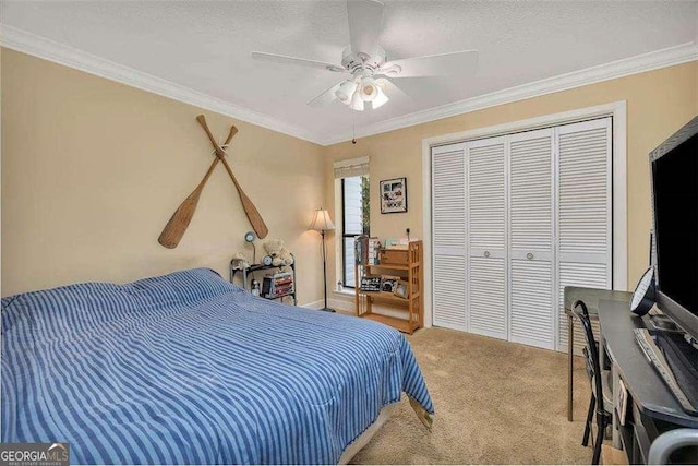 2510 Demere Rd Unit 7, Saint Simons, GA 31522 - bedroom featuring carpet, a closet, crown molding, ceiling fan, and a textured ceiling