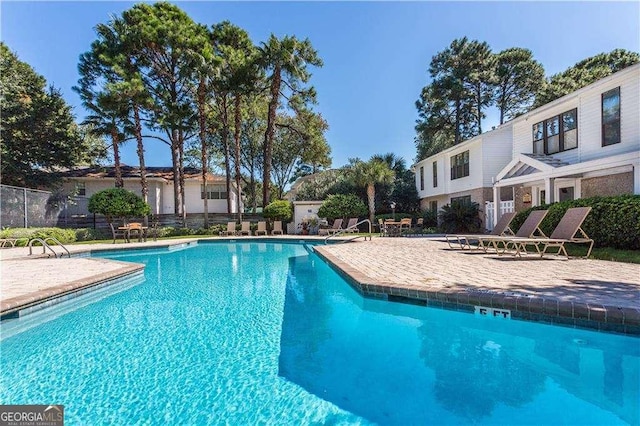 2510 Demere Rd Unit 7, Saint Simons, GA 31522 - community pool featuring a patio area