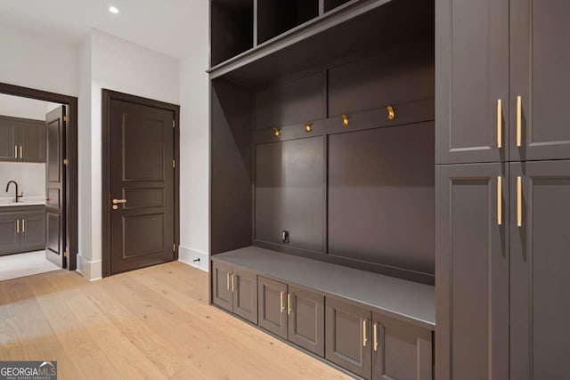 245 Traditions Dr, Alpharetta, GA 30004 - mudroom featuring light wood-style floors and recessed lighting