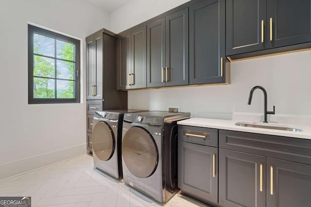 245 Traditions Dr, Alpharetta, GA 30004 - laundry area featuring cabinet space and washing machine and dryer