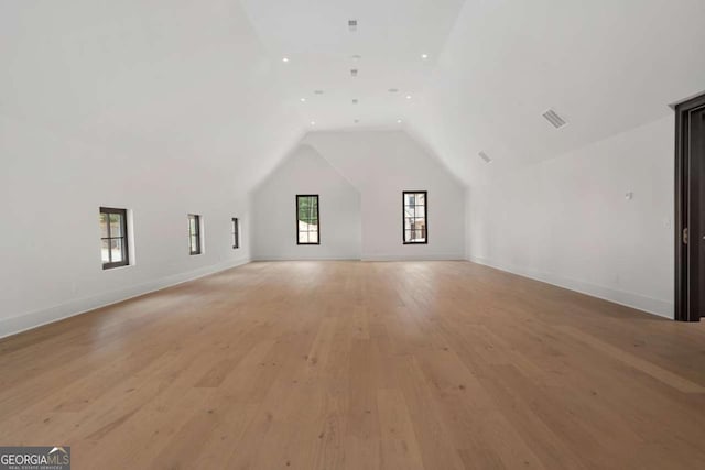 245 Traditions Dr, Alpharetta, GA 30004 - additional living space featuring lofted ceiling, light wood finished floors, and recessed lighting