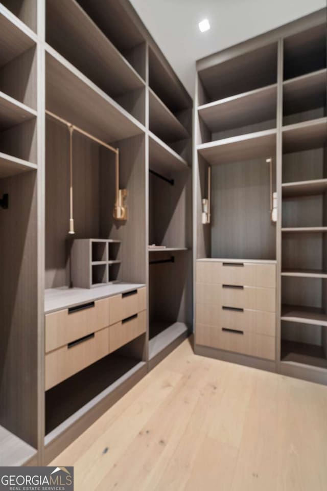 245 Traditions Dr, Alpharetta, GA 30004 - walk in closet featuring light wood-type flooring