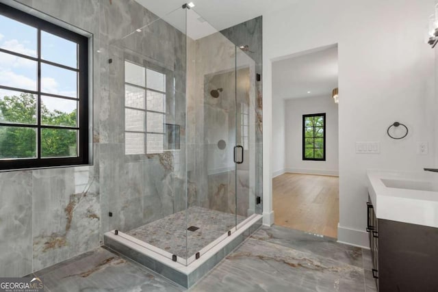 245 Traditions Dr, Alpharetta, GA 30004 - full bath with vanity, a stall shower, and marble finish floors
