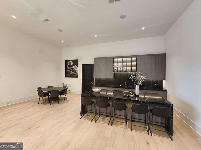 245 Traditions Dr, Alpharetta, GA 30004 - bar featuring light wood-type flooring and recessed lighting