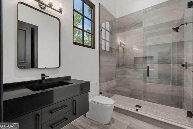 245 Traditions Dr, Alpharetta, GA 30004 - bathroom featuring vanity and a stall shower