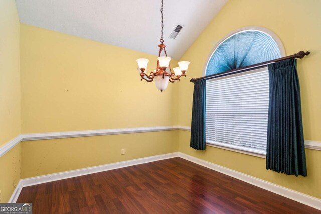 99 Rainwater Ln, Dallas, GA 30157 - unfurnished room featuring a chandelier, wood finished floors, and lofted ceiling