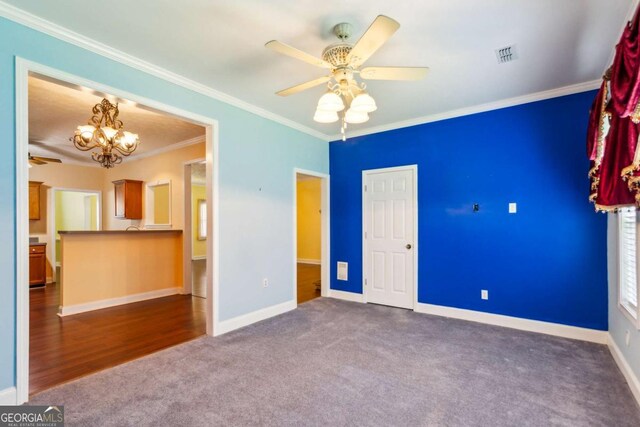 99 Rainwater Ln, Dallas, GA 30157 - unfurnished bedroom with carpet floors, a chandelier, and crown molding