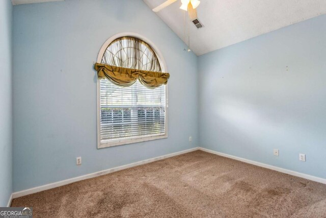 99 Rainwater Ln, Dallas, GA 30157 - unfurnished room featuring carpet, vaulted ceiling, and a ceiling fan