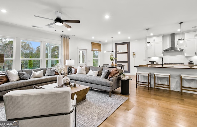 5390 Julep Ct, Cumming, GA 30028 - living room featuring ceiling fan, recessed lighting, and light wood-style flooring