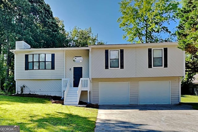 2478 Wood Meadows Dr SW, Marietta, GA 30064 - split foyer home featuring a garage, driveway, a front yard, and a chimney