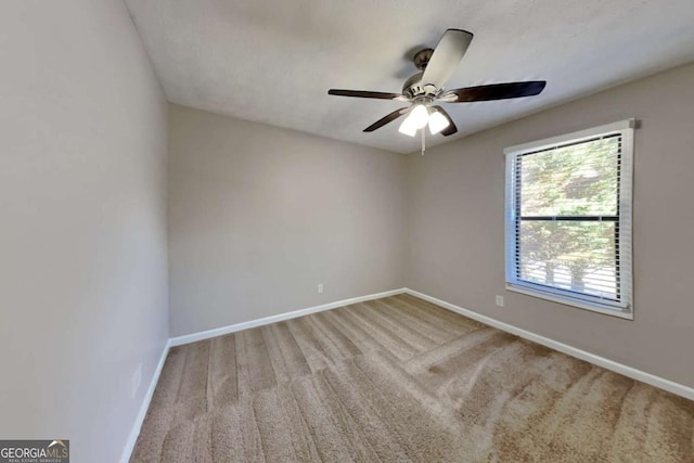 2478 Wood Meadows Dr SW, Marietta, GA 30064 - carpeted spare room with ceiling fan and baseboards