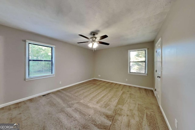 2478 Wood Meadows Dr SW, Marietta, GA 30064 - carpeted spare room featuring ceiling fan and baseboards