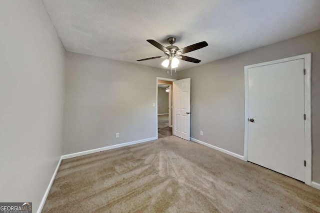 2478 Wood Meadows Dr SW, Marietta, GA 30064 - unfurnished bedroom featuring carpet and a ceiling fan