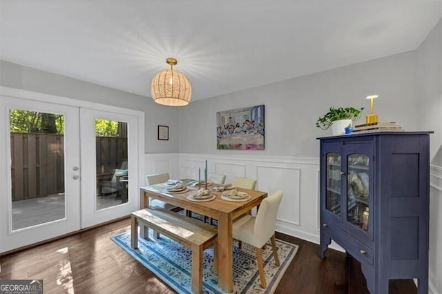 2 Arpege Way NW, Atlanta, GA 30327 - dining space featuring french doors, a wainscoted wall, wood finished floors, and a decorative wall