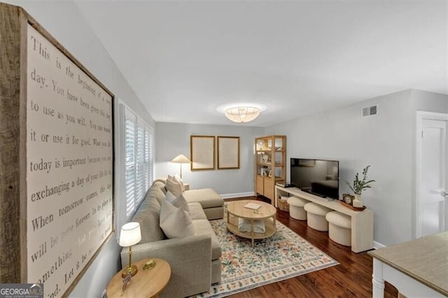 2 Arpege Way NW, Atlanta, GA 30327 - living room featuring dark wood-style flooring and baseboards