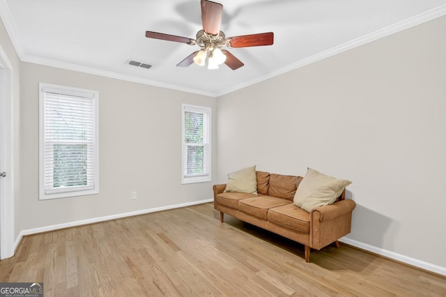 5037 Laurel Springs Way SE, Smyrna, GA 30082 - sitting room with light wood-style flooring, baseboards, ornamental molding, and ceiling fan
