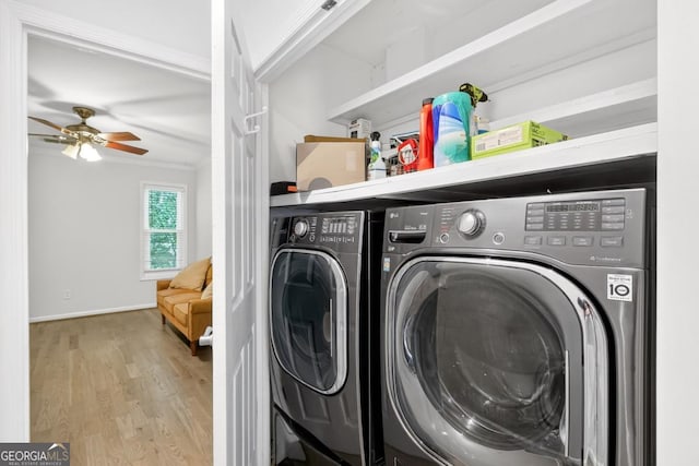 5037 Laurel Springs Way SE, Smyrna, GA 30082 - laundry room featuring wood finished floors, separate washer and dryer, baseboards, and a ceiling fan