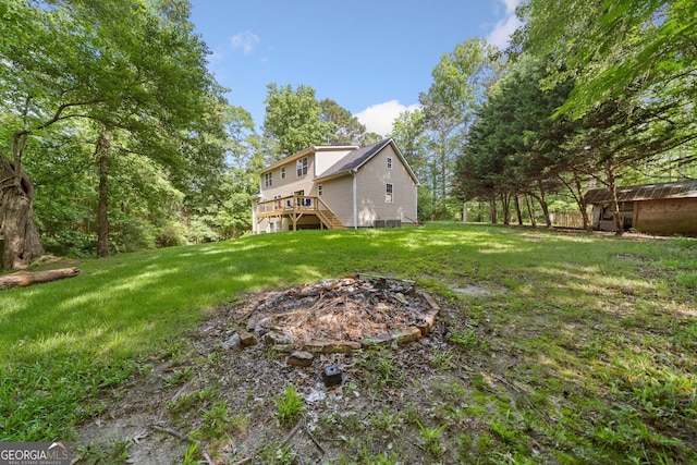 2958 Paul Harris Rd, Dallas, GA 30157 - view of grassy yard featuring a fire pit, a wooden deck, and stairway