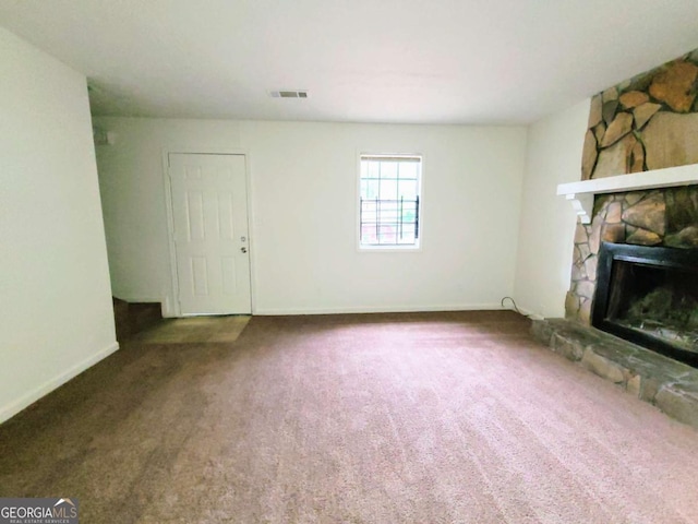 1225 Creek Forest Ct NW, Conyers, GA 30012 - unfurnished living room featuring carpet flooring, a fireplace, and baseboards