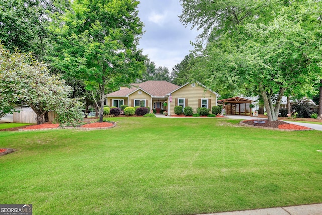 55 Ashton Pl, Covington, GA 30016 - ranch-style house featuring a gazebo, a front yard, and a carport