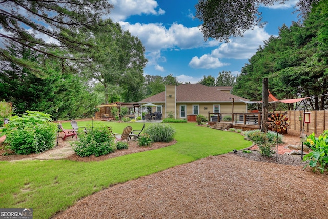 55 Ashton Pl, Covington, GA 30016 - rear view of property with a chimney, a deck, a shingled roof, and a patio